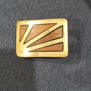 Brass belt buckle with wood inlay design